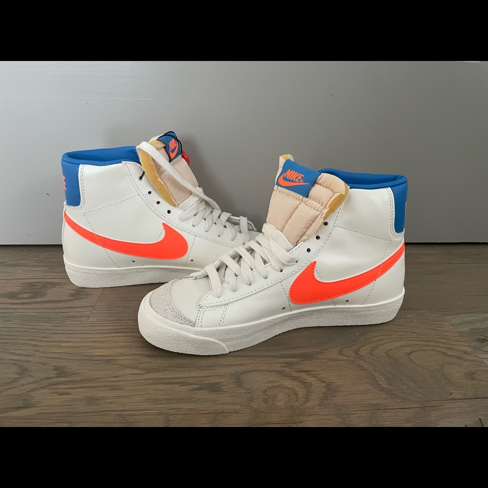Orange and blue Nike blazers